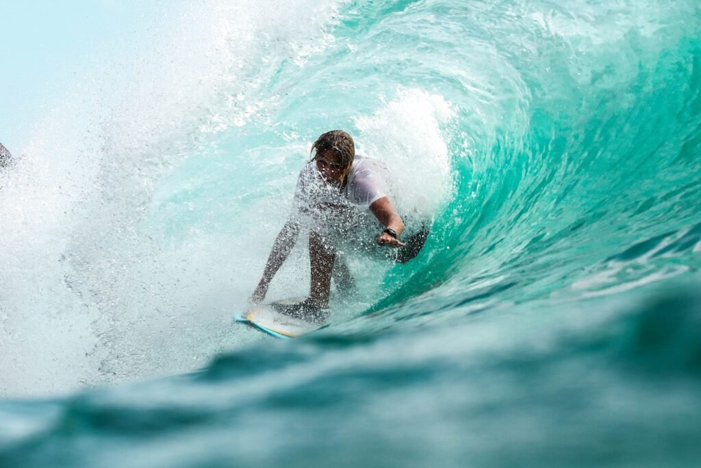 time lapse photography surfer in wave water